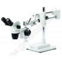 Microscope with hinged overhanging stand